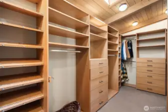 Primary walk-in closet with built-ins