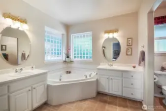 Such a pretty bathroom with all the bells and whistles!
