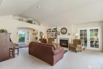 Spacious living room with french doors into Den which could be a 4th bedroom.