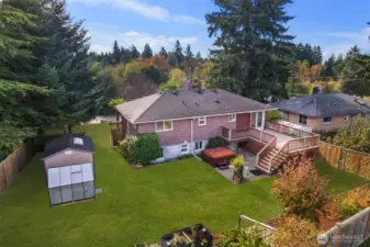 Drone shot of the Beautiful Manicured Yard and Deck