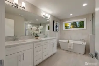 Step into your private, spa-inspired en-suite, where serene design meets indulgent luxury. Dual sinks, gleaming quartz countertops, and thoughtful finishes create a retreat that transforms everyday routines into moments of relaxation and rejuvenation.