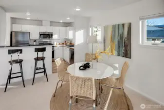 View to kitchen and bar area, great for socializing.
