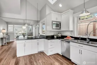 Open to dining room and living room