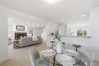 Dining area + kitchen (staged)