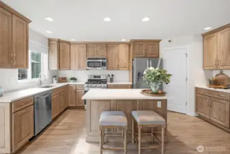 Bright Kitchen with quartz countertops.