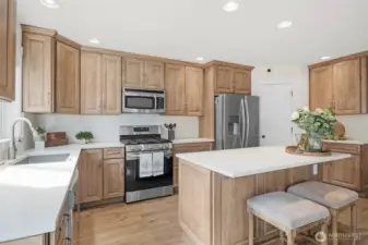 Bright Kitchen with quartz countertops.