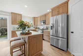 Bright Kitchen with quartz countertops.