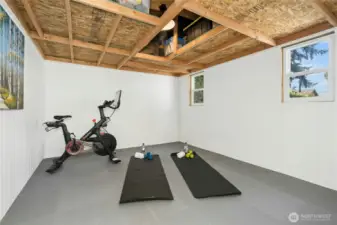 Detached outbuilding with electricity. Use for your work-outs or when working from home.