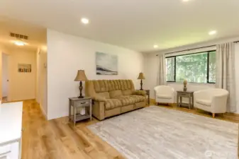 Spacious family room with updated canned lighting.