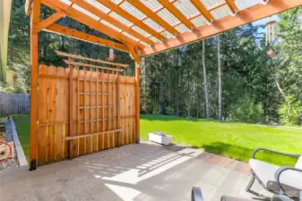 Retractable awning for added shade when needed at the end of this covered patio.