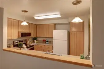 View toward the kitchen from the dining area.