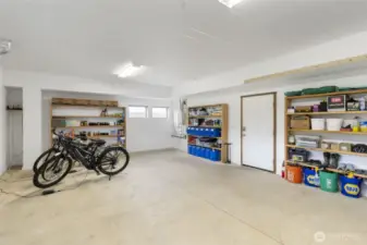 Bright workshop space with shelving, workstations, and plenty of room to create.