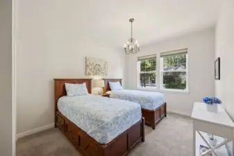 Bedroom 2 is roomy and has custom blinds.