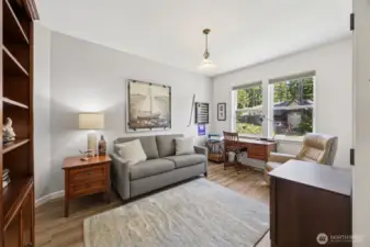 Large den is off the entry and very quiet and private -- could be a home office, and has plenty of room for a sleeper sofa.