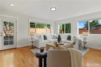 Bonus room addition with direct access to the backyard. This is a sunny, cheerful room.
