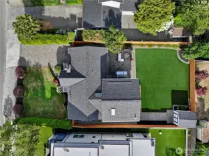 The property is just over 8,000 approx. sq. ft. Gentle slope to the front yard and deep backyard. The parking is quite wide with additional parking right in front of the house.