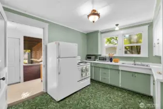 Kitchen and access to enclosed porch