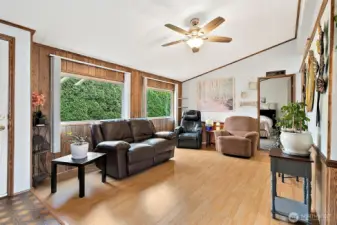 Inside is open and bright with clean laminate floors