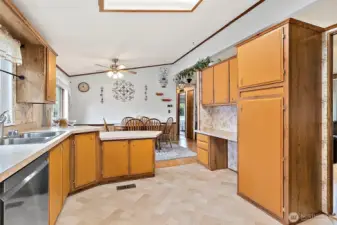 Kitchen open to dining and living areas