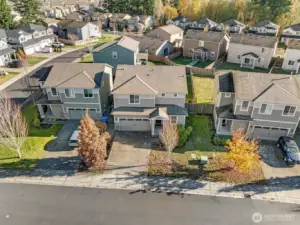 Overhead view showcasing mature landscaping with vibrant colors