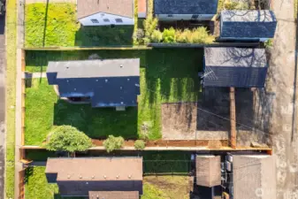 Rare two-lot property offering extra space, privacy, and excellent DADU or expansion potential.