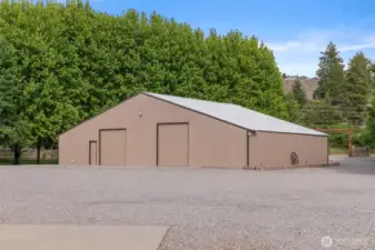 3,000+ sq ft shop with full bathroom, Washer/Dryer, central HVAC, heavy-duty/upgraded electrical service, bonus room and oversized doors for parking your large RV indoors!