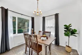 The Picturesque Dining Room has wonderful natural light and maintains the original charm and character.