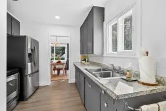 Kitchen features Stainless-Steel Appliances that stay for new owners.