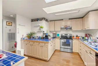 Unique Layout provides tons of cabinets and plenty of counter space!