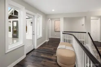 2nd floor foyer opens to view deck