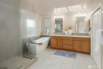 Primary, spa-like bathroom updated in 2018.