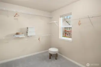 Primary walk-in closet.
