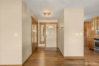 Wood trimmed doors, Hardwood floors.