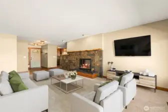 Wood Burning Fireplace, Slate stone work and wood mantel complete the accent. Virtually staged