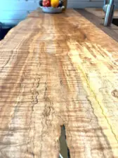Prized figured maple makes a huge statement in the kitchen