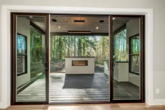 Double-door slider allowing access to the covered outdoor living.