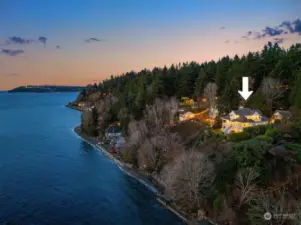 Welcome to Three Tree Point with this meticulously restored colonial home bordering 60 feet of private Puget Sound shoreline and resting on an 0.5-acre serene estate.