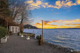 View towards the south side with Three Tree Point in the background. Running water and electricity at the beach. The shed has a beverage refrigerator and sink including a spray handle.