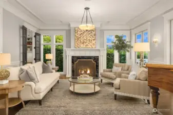 Modern comforts and beautiful details for this living room. The house was fully restored with new extensive handcrafted millwork and designs inspired by 1909 Grand Dutch Colonial homes. Each of the four fireplaces is a masterpiece in itself. Come closer to appreciate each one.