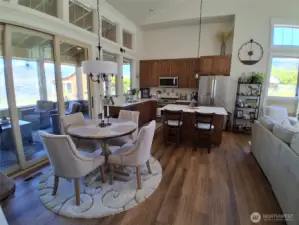 Bright Open Kitchen with Island and Veranda Access