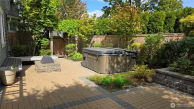 Relaxing in the outdoor spa and by the cozy firepit.