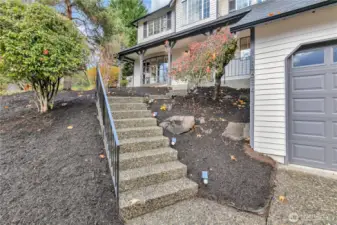 Pathway and front steps leading to covered entry