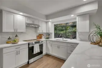 Full-height quartz backsplash.