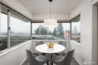 Off the kitchen is a nook for your informal dining.