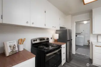 Functional kitchen with newer appliances.
