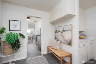 Utility room acts a butler's pantry too with its built ins and side passage to kitchen and hall.
