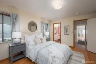 Secondary primary bedroom with adjacent full bathroom.