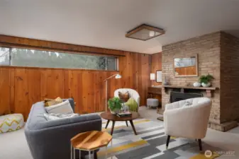 Lower level is a perfect down time space.  Wood burning fireplace and potential for multi-generational living.