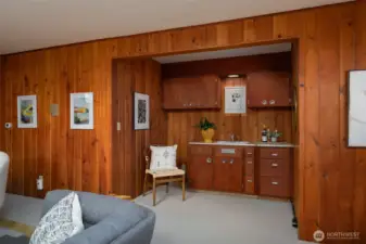 Lower level has kitchen set up, perfect for entertaining, secondary kitchen or future build out.