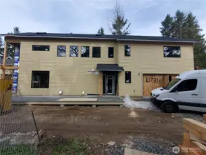 10731-B 17th Ave NE. 2165sf over 2 levels. 3BR, 2.75BA, 2-car garage + space for third car.  Completion early July 2026.